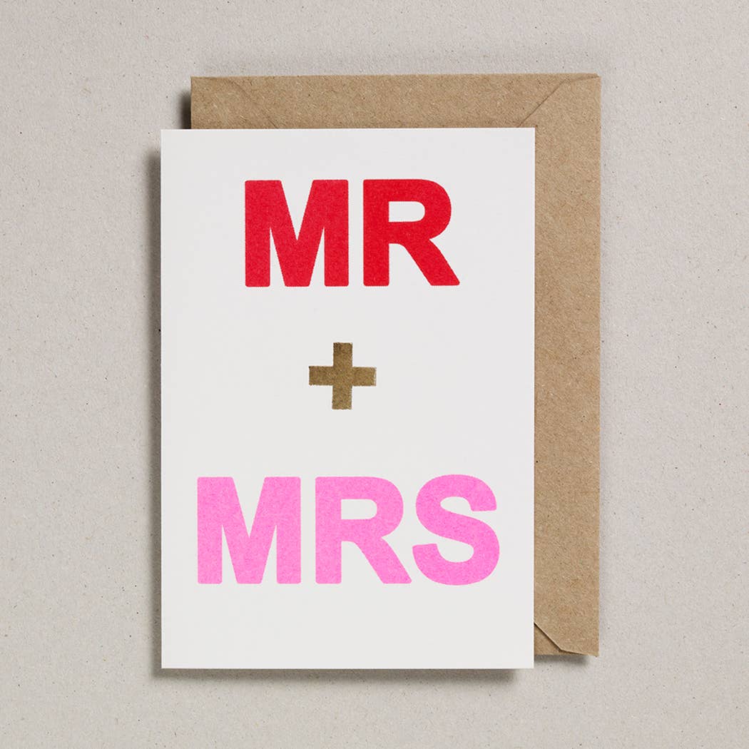 Greetings card with text in bold that reads 'MR + MRS'.  MR in red, + in gold and MRS in pink.