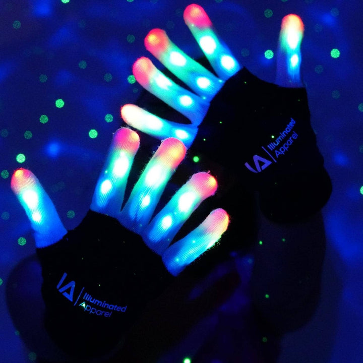 Black gloves with colorful LED lights on a dark background