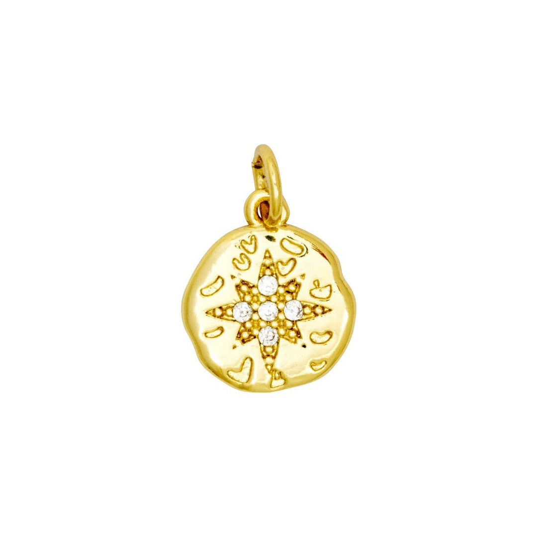 A gold-colored round coin charm with a star design and cubic zirconia inlay.