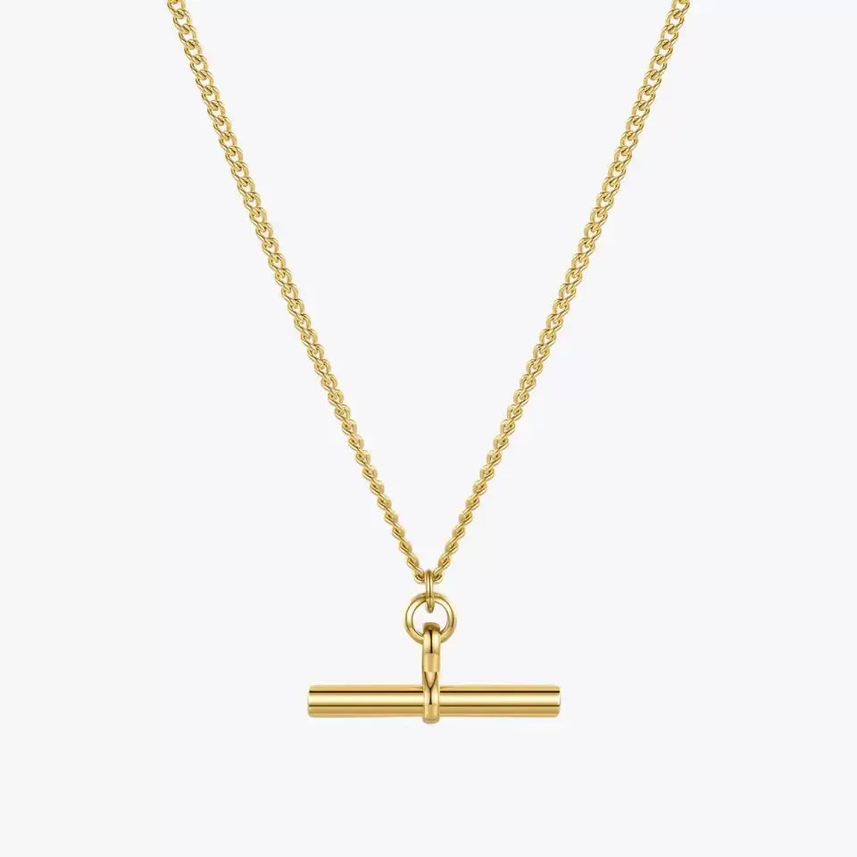 A gold-plated stainless steel T-bar necklace on a gold chain against a white background.