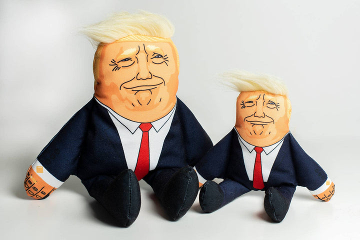 Two plush toys resembling a person in a suit with a red tie on a light gray background