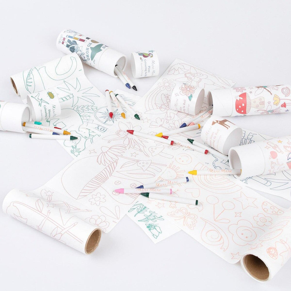 Coloring books with markers on a white surface