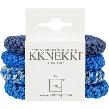 Three blue crochet hair ties on a white card with Kknekki branding.