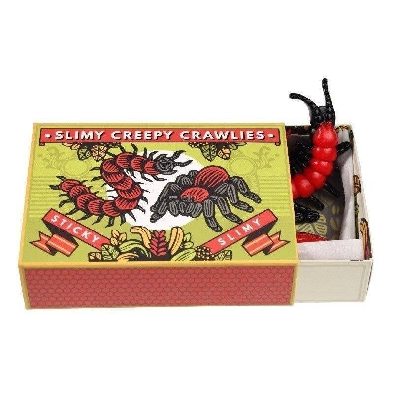 Box of Slimy Creepy Crawlies with a red and black insect toy inside.
