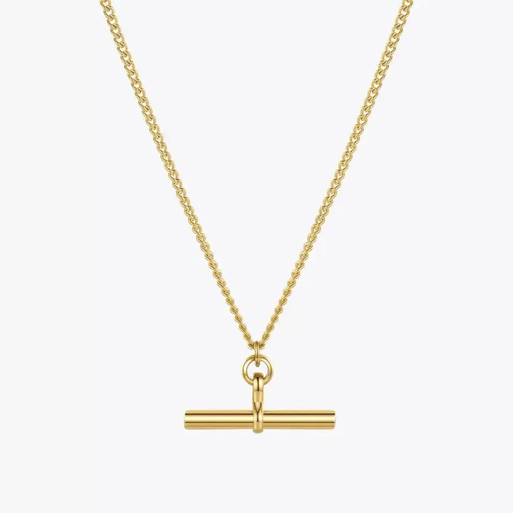 A gold-plated stainless steel T-bar necklace on a gold chain against a white background.