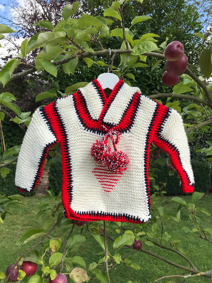 Pom Pom Jumpers made from cosy wool, made in Malta.